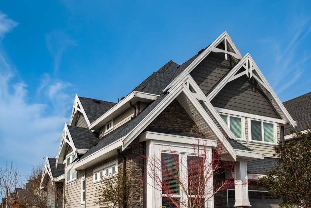 Finished home with a new dark asphalt shingle roof
